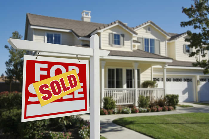 House with Sold Sign